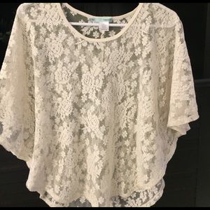 Cream, lace shirt.