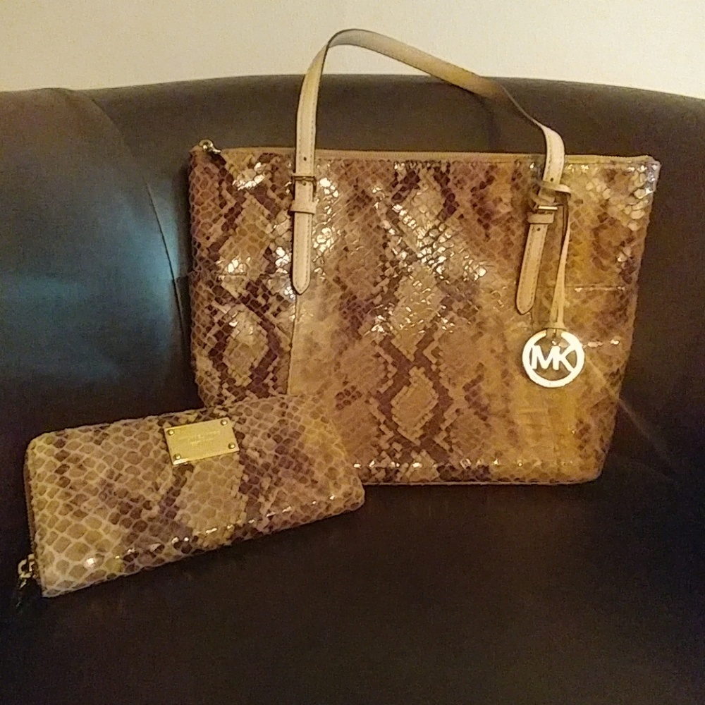 SOLD..Authenic Michael Kors purse and wallet.