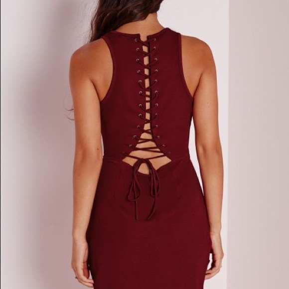 Missguided Dresses & Skirts - lace up back bodycon dress burgundy size 4