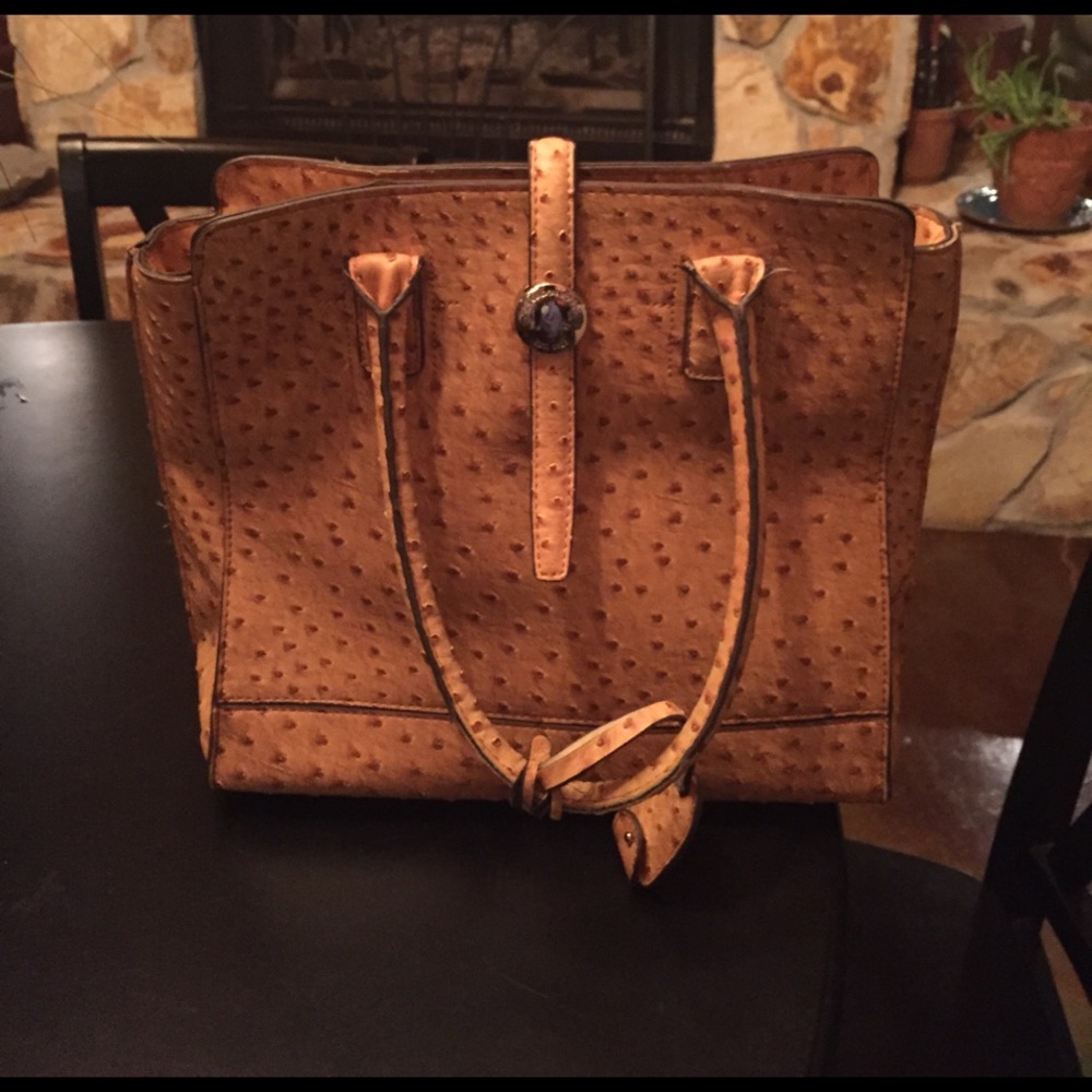 London Fog Leather stamped ostrich purse