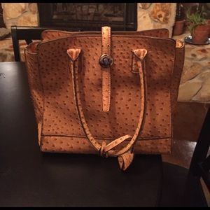 London Fog Leather stamped ostrich purse