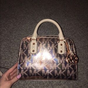 Mini, Rose gold hand bag.