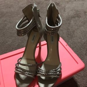 Stylish sandals still with price on.