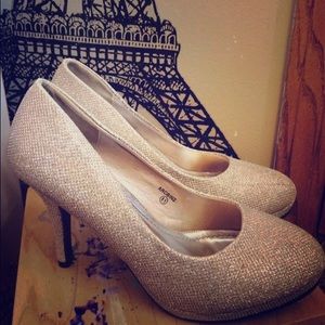 Gold sparkly high heels