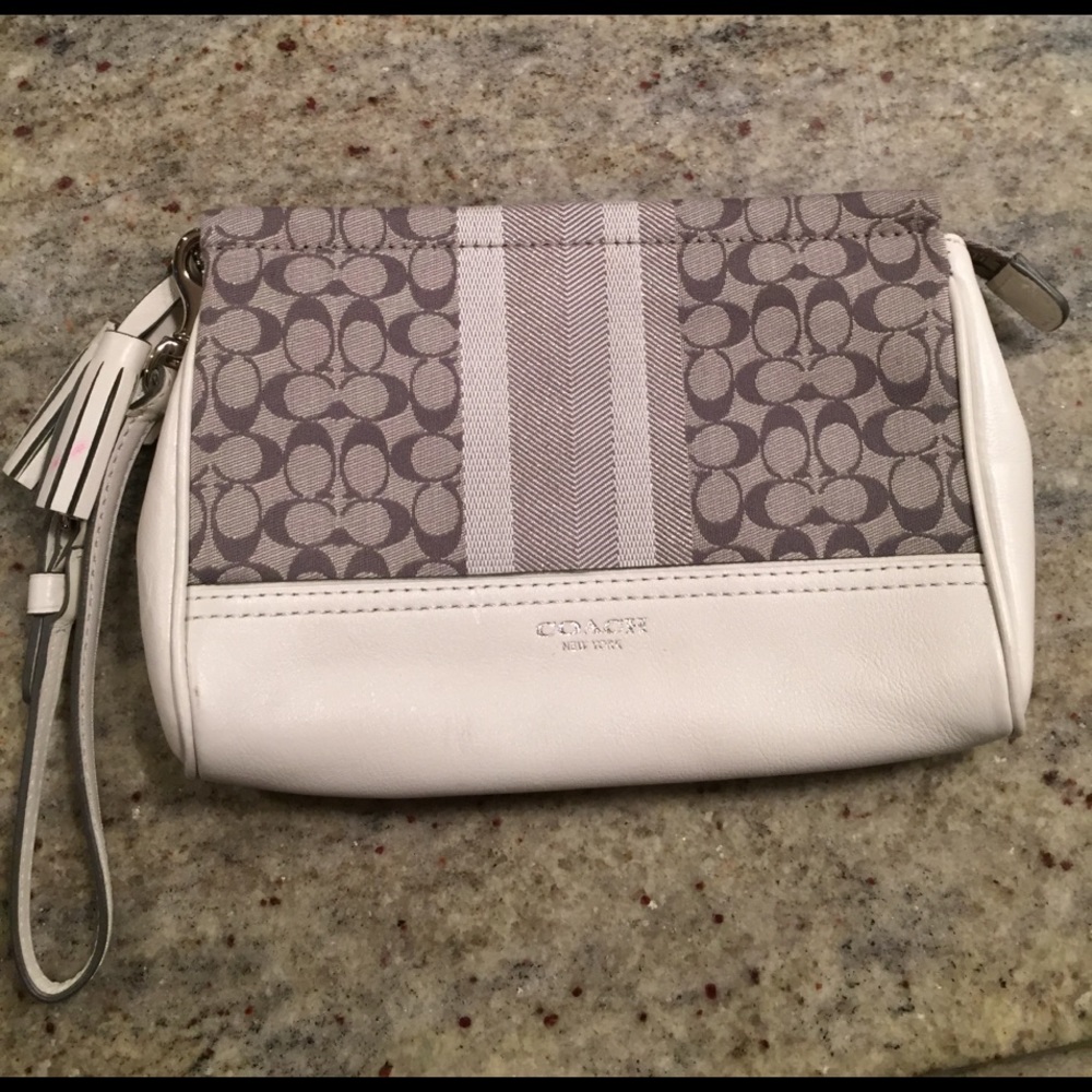 Coach clutch with wrist strap