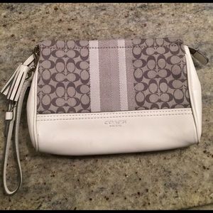 Coach clutch with wrist strap