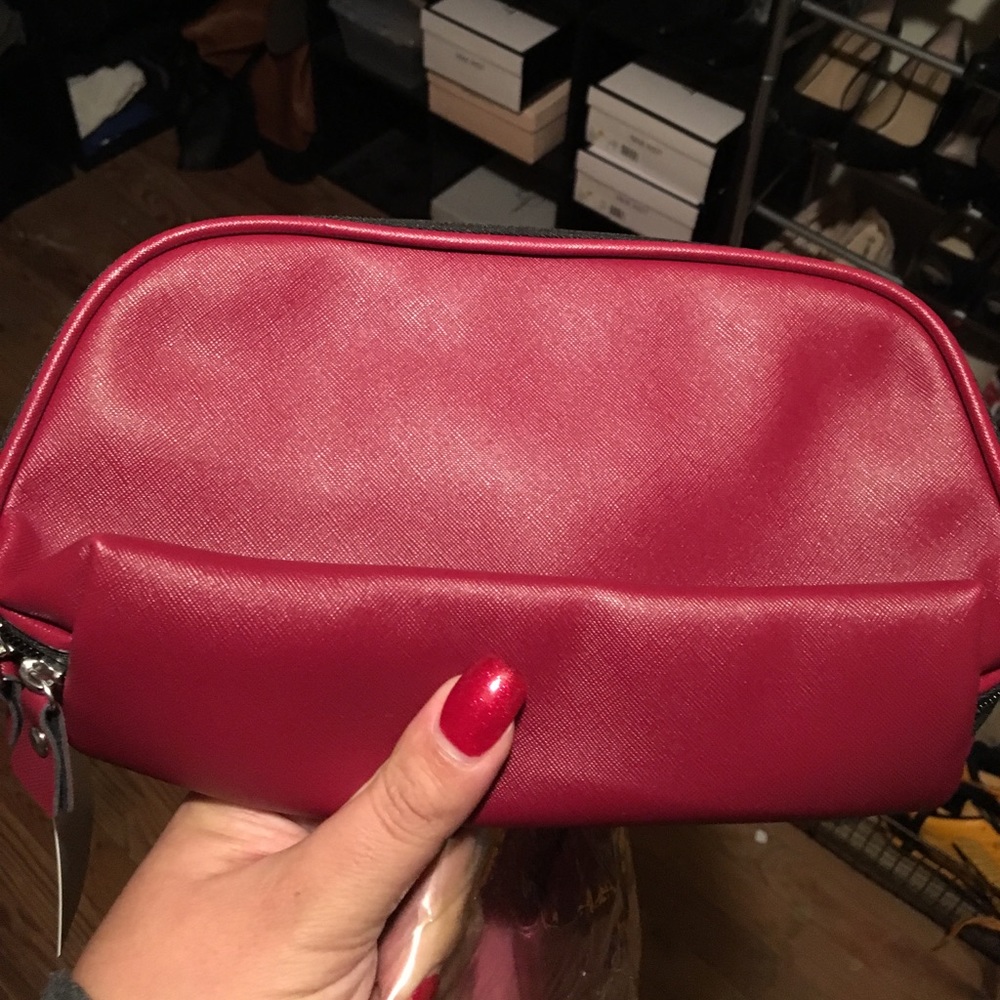 Brand new with tags red makeup bag