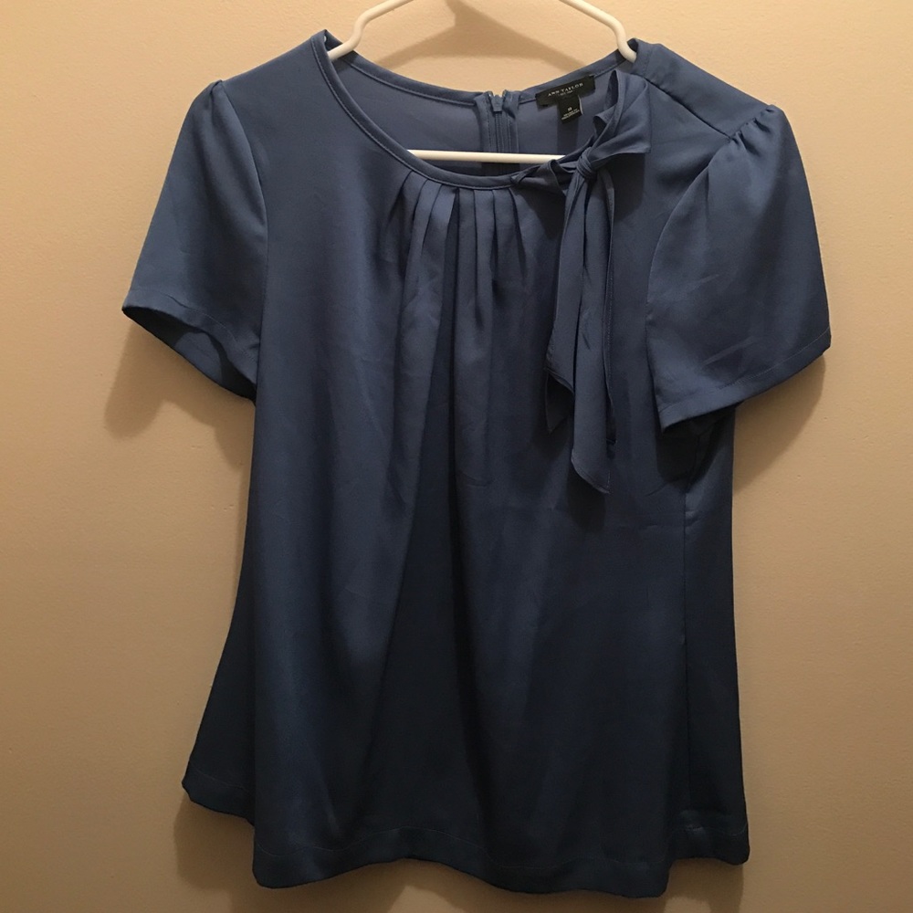 Blue top with bow