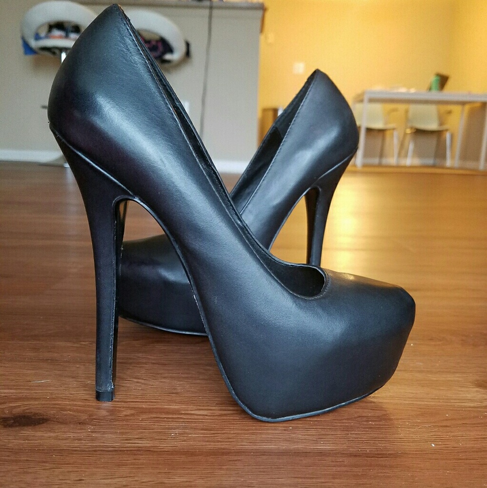 Black Steve Madden heels with platform