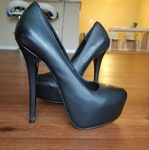 Black Steve Madden heels with platform