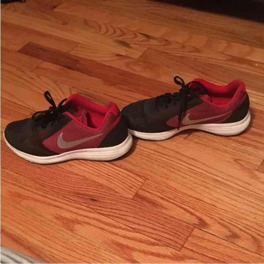 Boys black and red Nike running sneakers