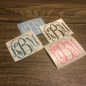 Four monogram decals