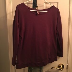 long sleeved tight purple shirt