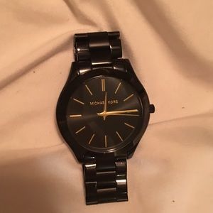 Black and gold Michael Kors watch