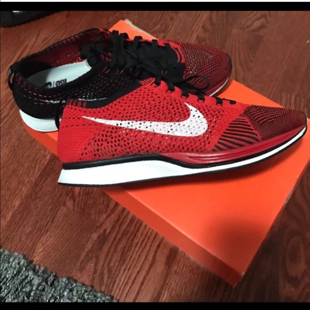 ISO University red Nike flyknit racer.
