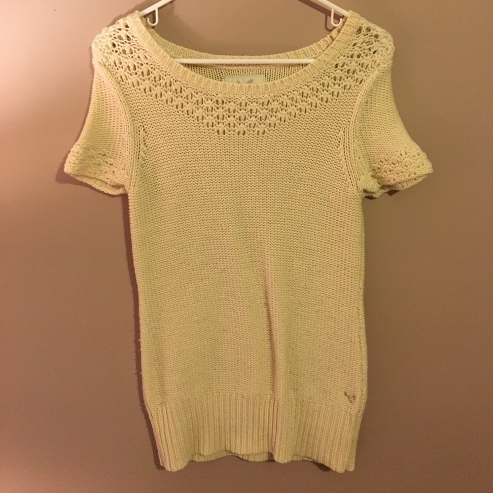 Cream colored short sleeve sweater