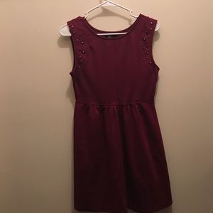 Studded, burgundy dress.