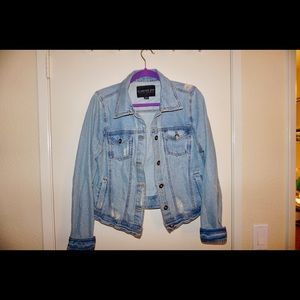 Distressed denim jacket
