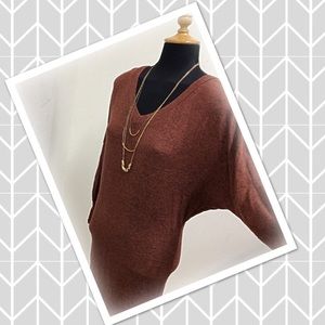 Beautiful rust brown v-neck sweater dress