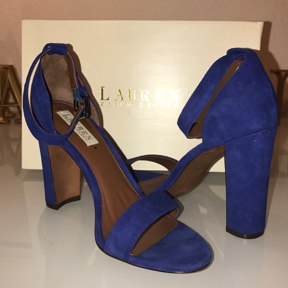 Blue suede strappy sandals .