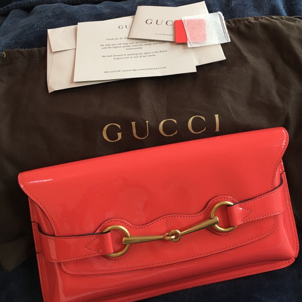 Spacious Gucci bright bit clutch