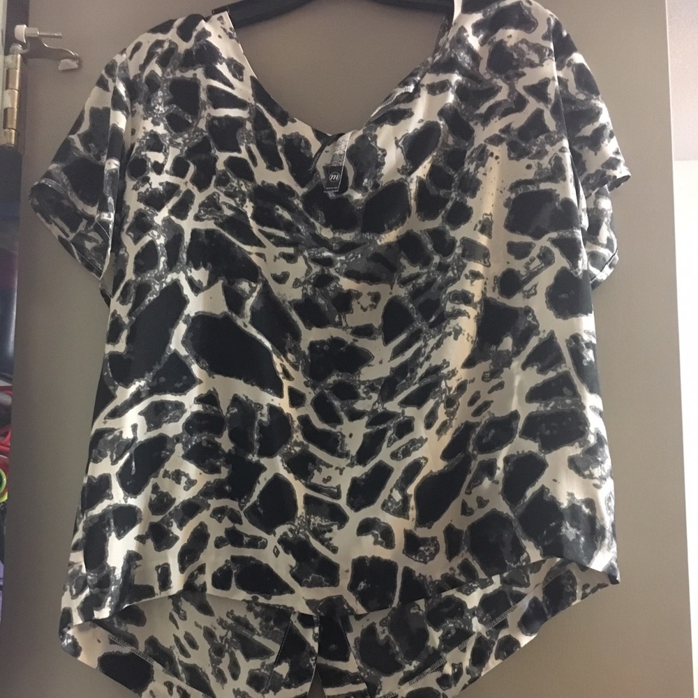 Black and White blouse! Buttons down in back