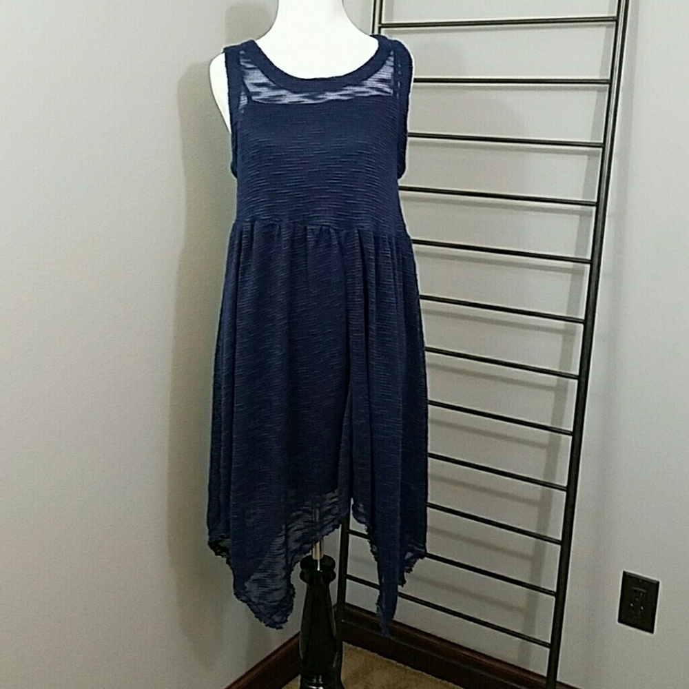 Navy dress with staggered hem.