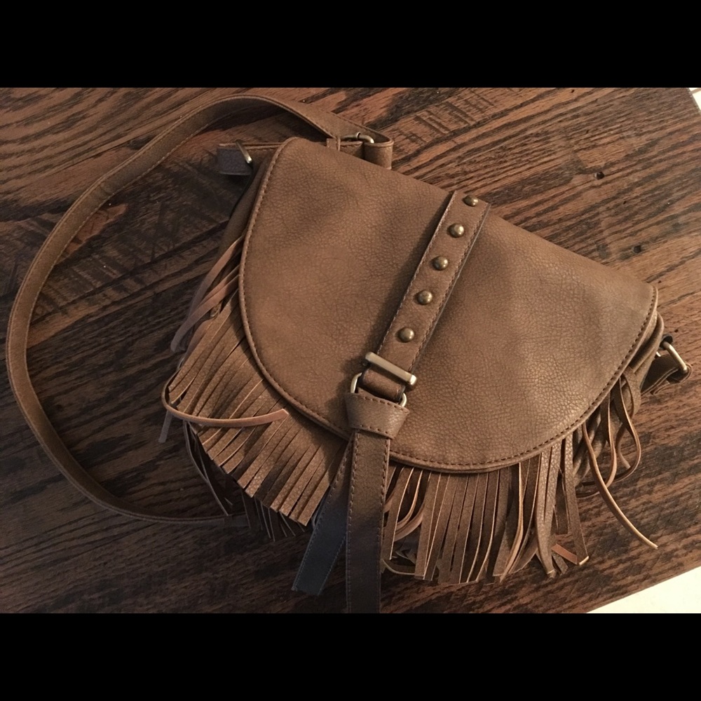 Cross body purse with fringe