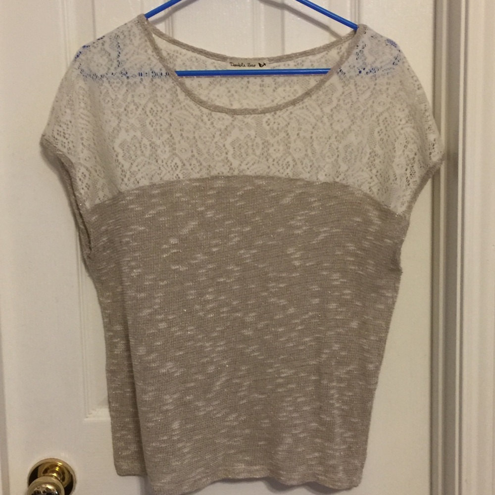 Knitted blouse with gold threading.