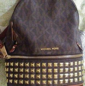 Michael kors brown and gold backpack