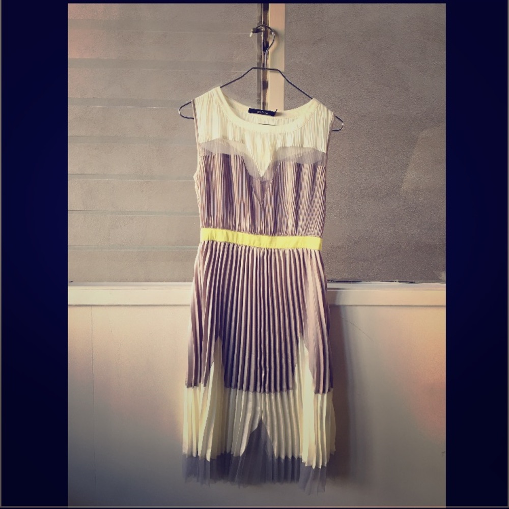 Airy, pleated silver dress with gauze detail