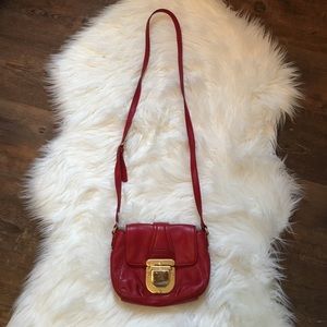 Red Michael Kors handbag
