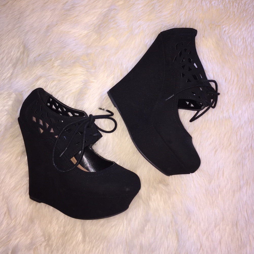 Black detailed platforms