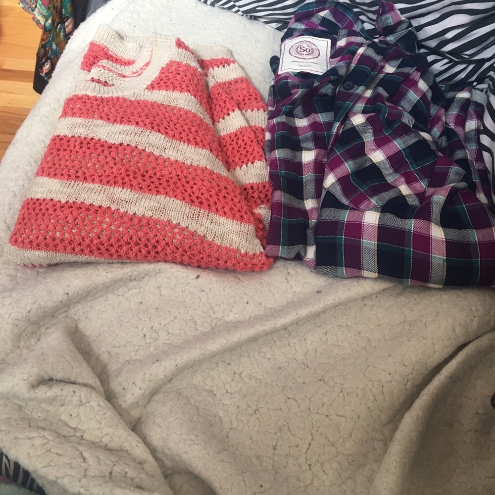 One sweater, one button down shirt