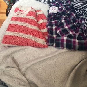 One sweater, one button down shirt