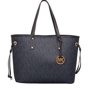 MICHAEL KORS PURSE.