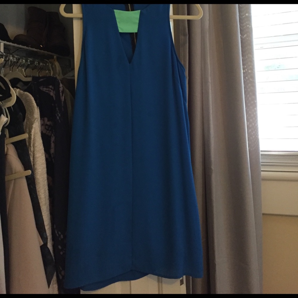 Cocktail dress with teal detail &exposed  zipper