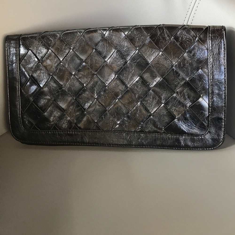 Urban Expressions black leather woven clutch