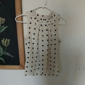 Sleeveless polka dot blouse