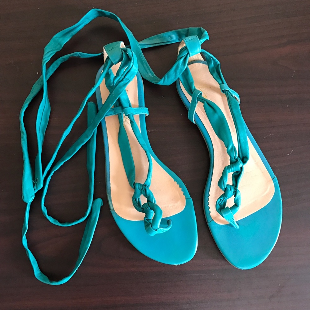 Vacation ready teal leather wrap sandals