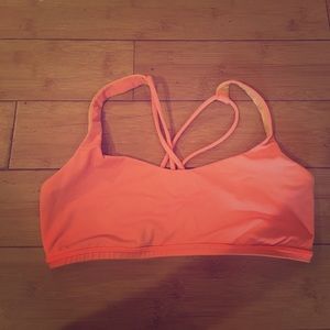 Orange Lululemon sports bra