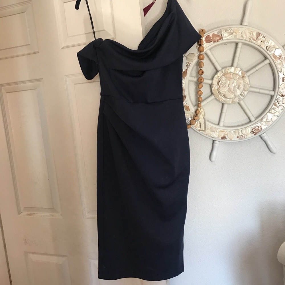 Figure-hugging, navy blue, elegant, midi dress.