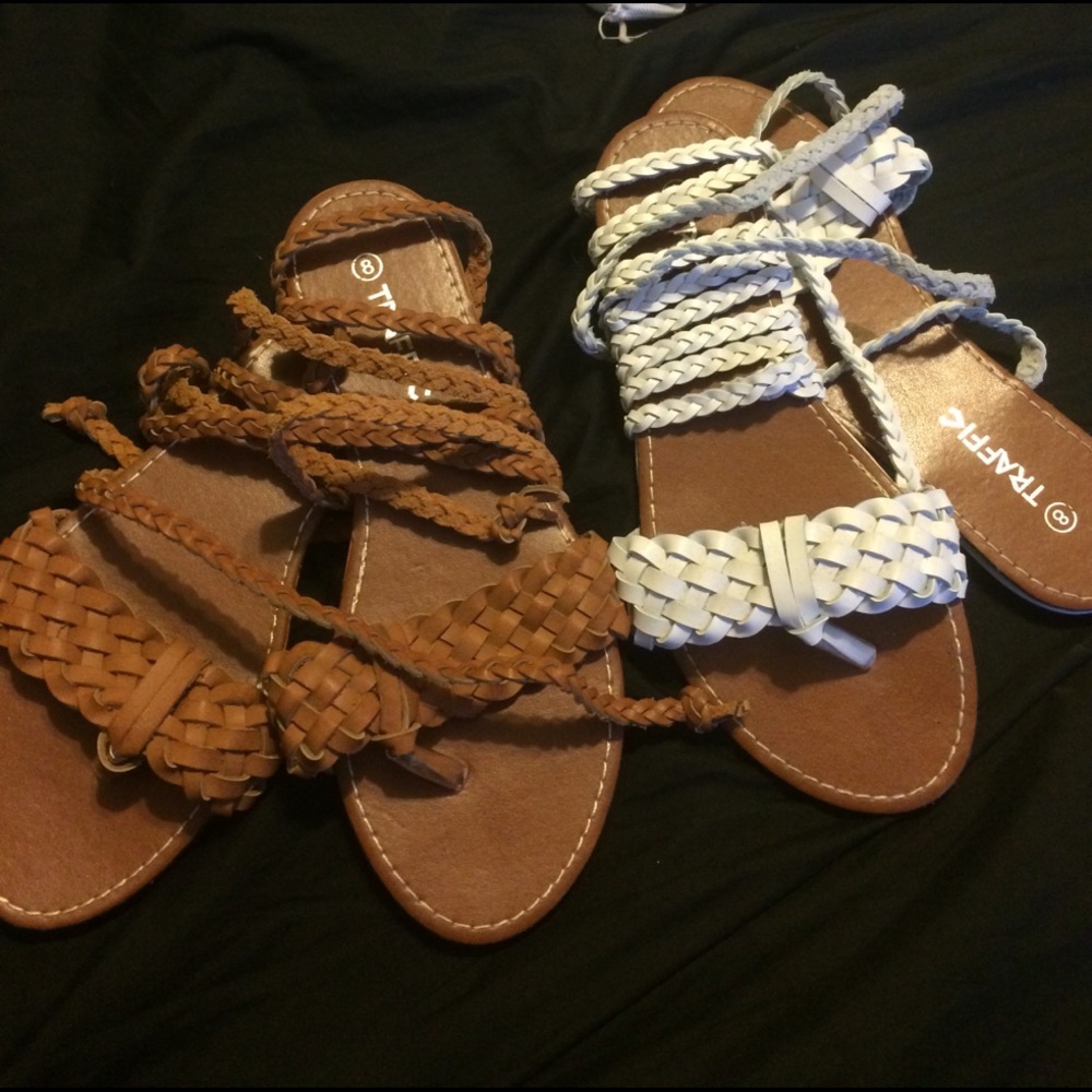 two pairs of gladiator sandals