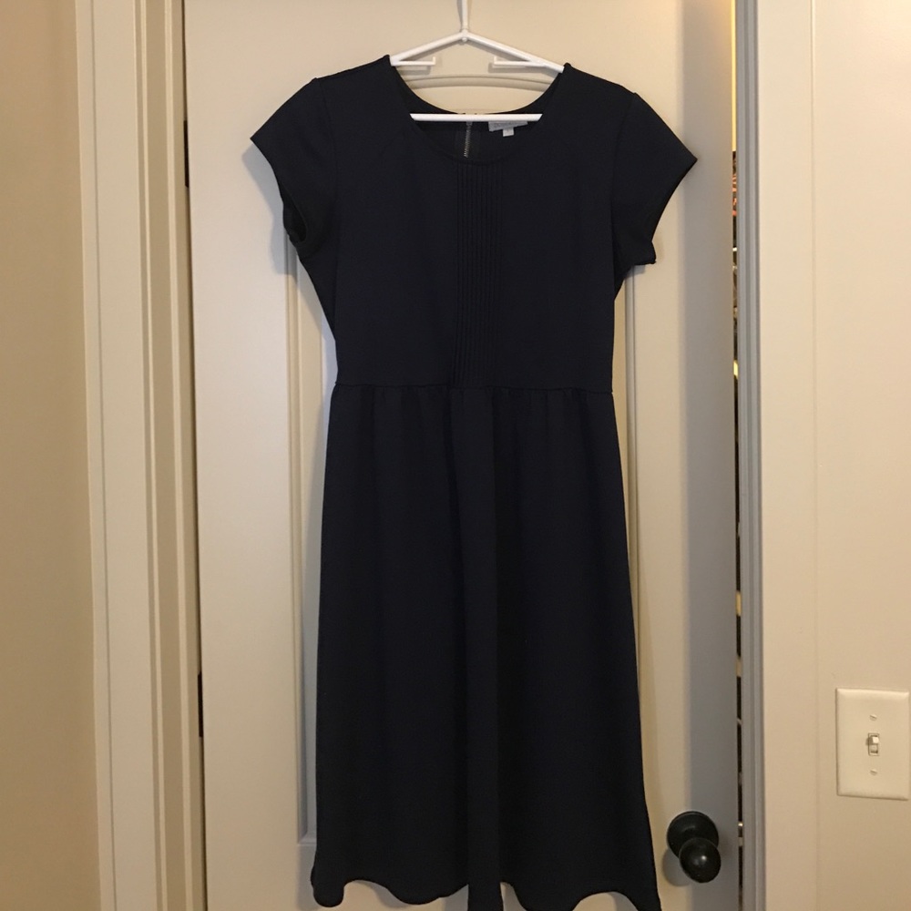 Navy knee length dress. Good condition.