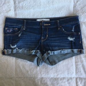 Dark wash, distressed, cuffed, low rise shorts
