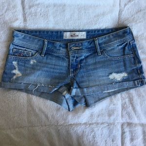 Medium wash, distressed, cuffed low rise shorts