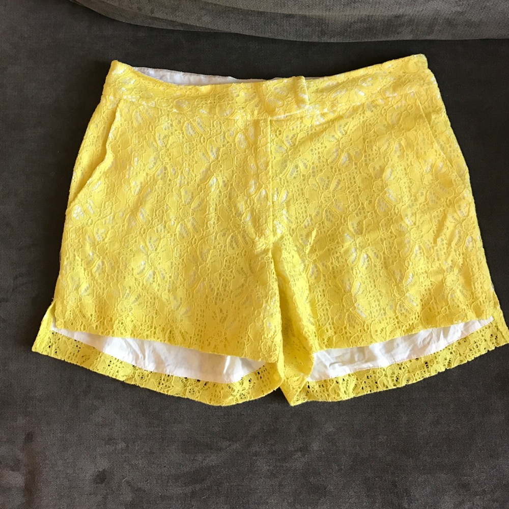 Yellow shorts by Sam and Lavi.