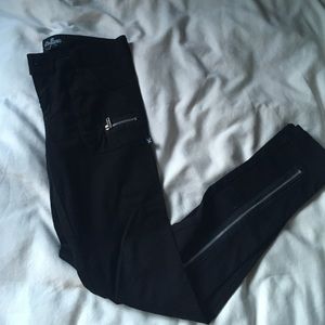 Black skinny pants with zippers