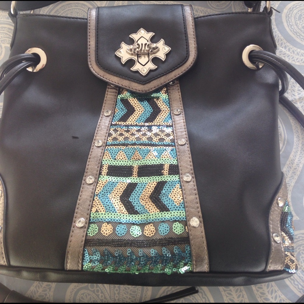 Miss me purse, cross body, satchel type.