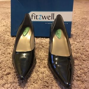 Patent leather pumps.